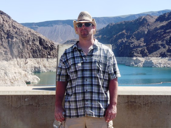 The author standing on top of Hoover Dam in Arizona and Nevada